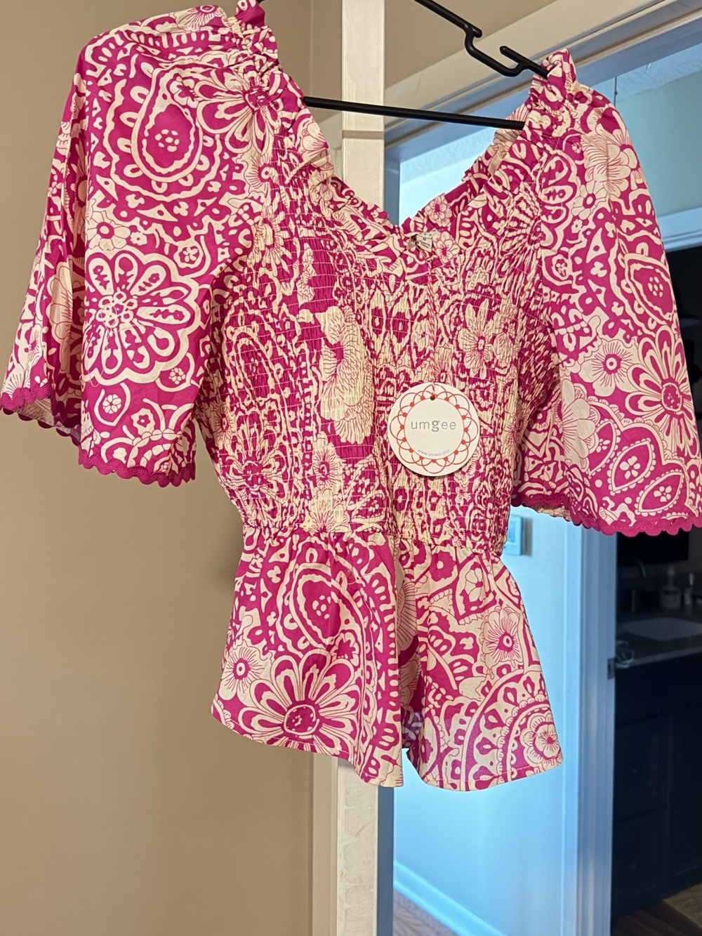 Umgee Pink and Cream Floral Smocked Peplum Blouse
